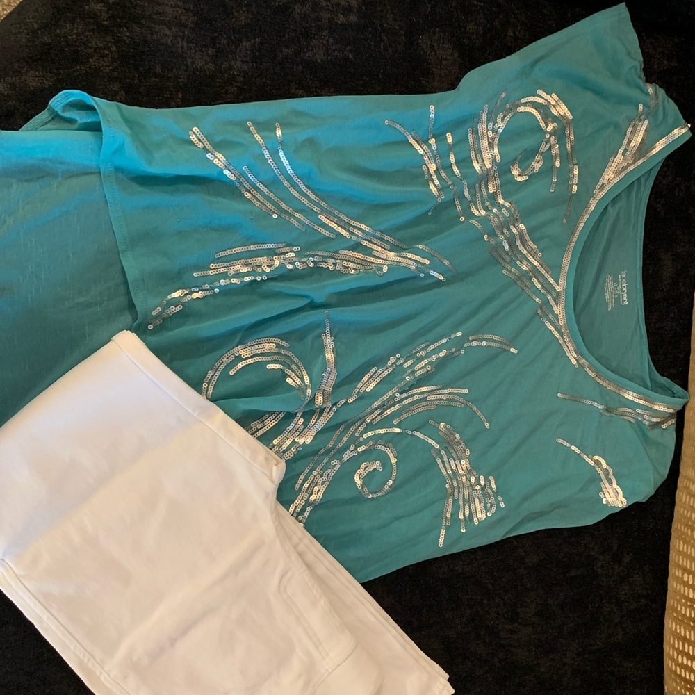 LANE BRYANT DESIGNER TEAL AND SHIMMERING SILVER O’s and white denim leggings.